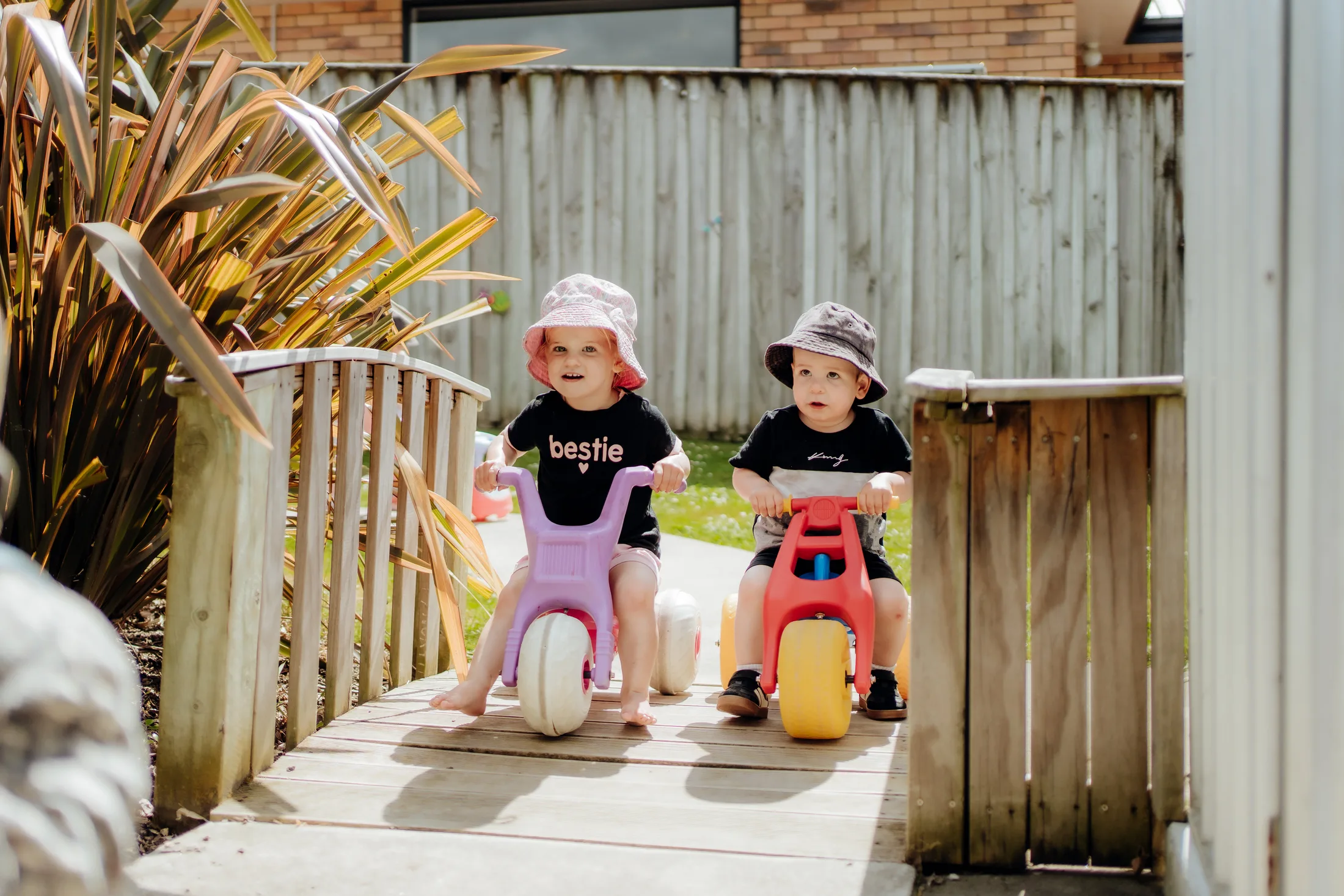 Two Mini Legends riding outdoors