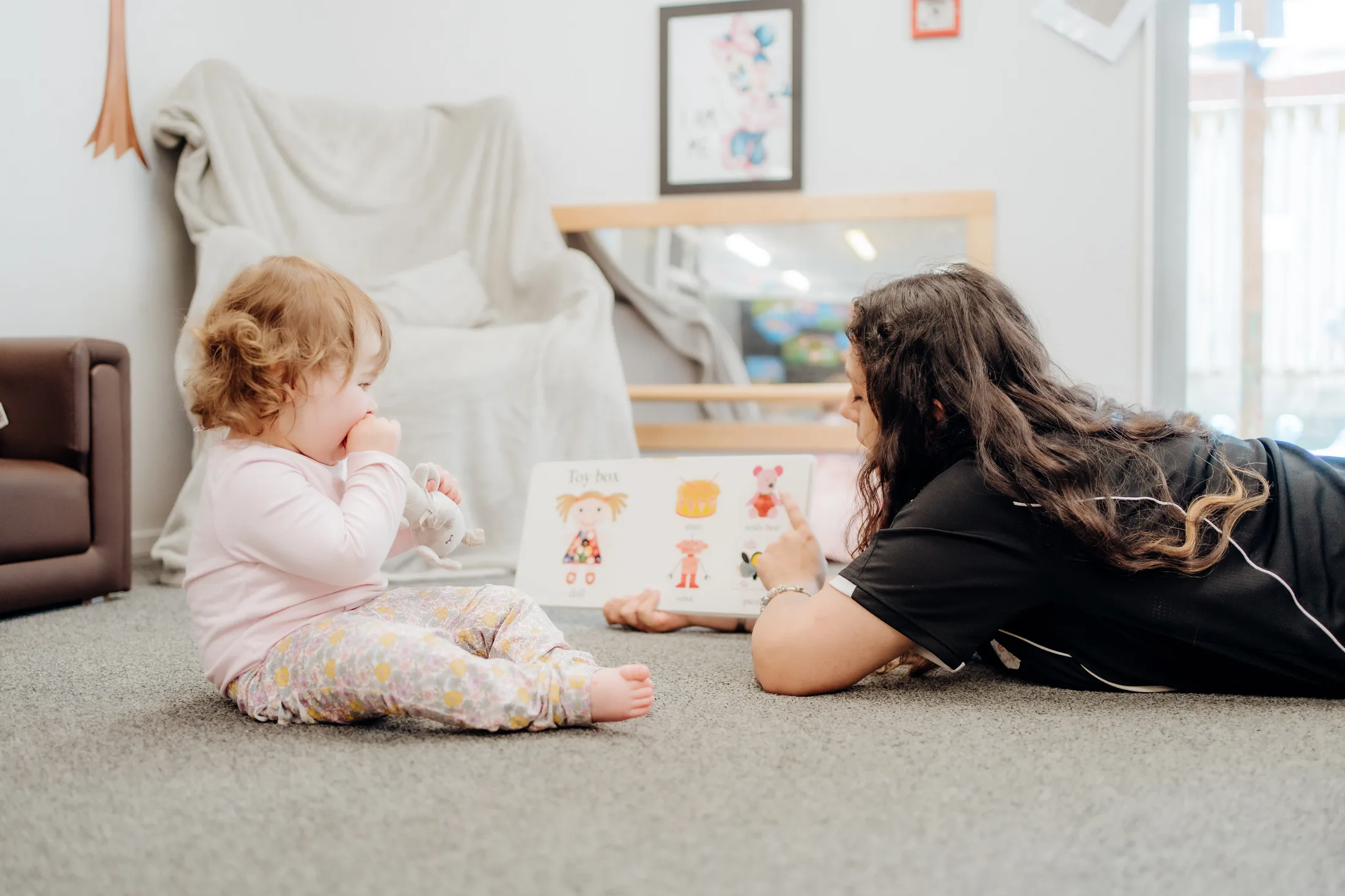 A calm shared reading moment in Mini Legends